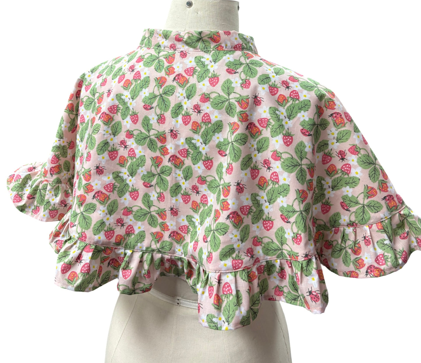 “Miriam” Capelet with ruffle in Ladybirds and strawberries