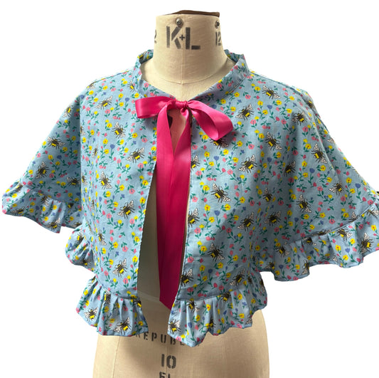 “Miriam” Capelet with ruffle in blue floral and bees
