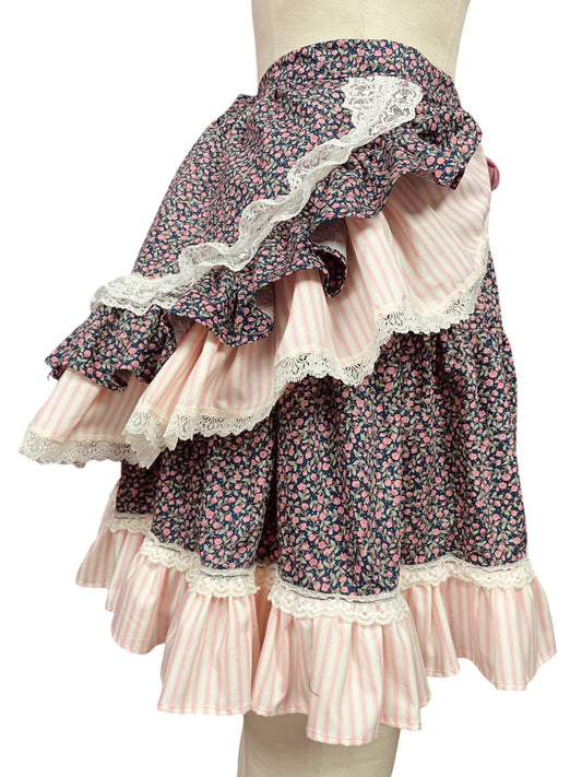 Tie-on Ruffle Bustle in Navy ditsy floral & Pink candy stripes & trimmed with vintage Lace