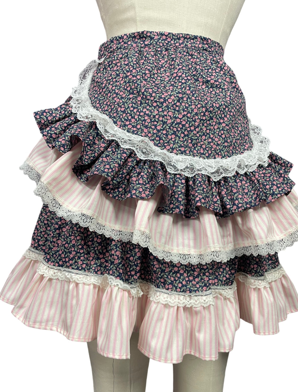 Tie-on Ruffle Bustle in Navy ditsy floral & Pink candy stripes & trimmed with vintage Lace